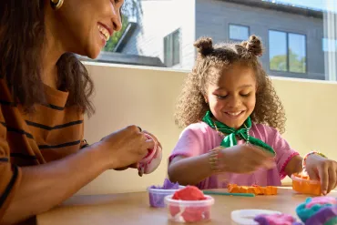 mom and little girl crafting